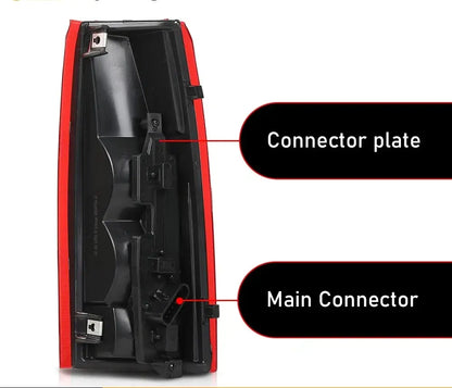 Back view of C/K truck tail light assembly showing circuit board and wiring connectors